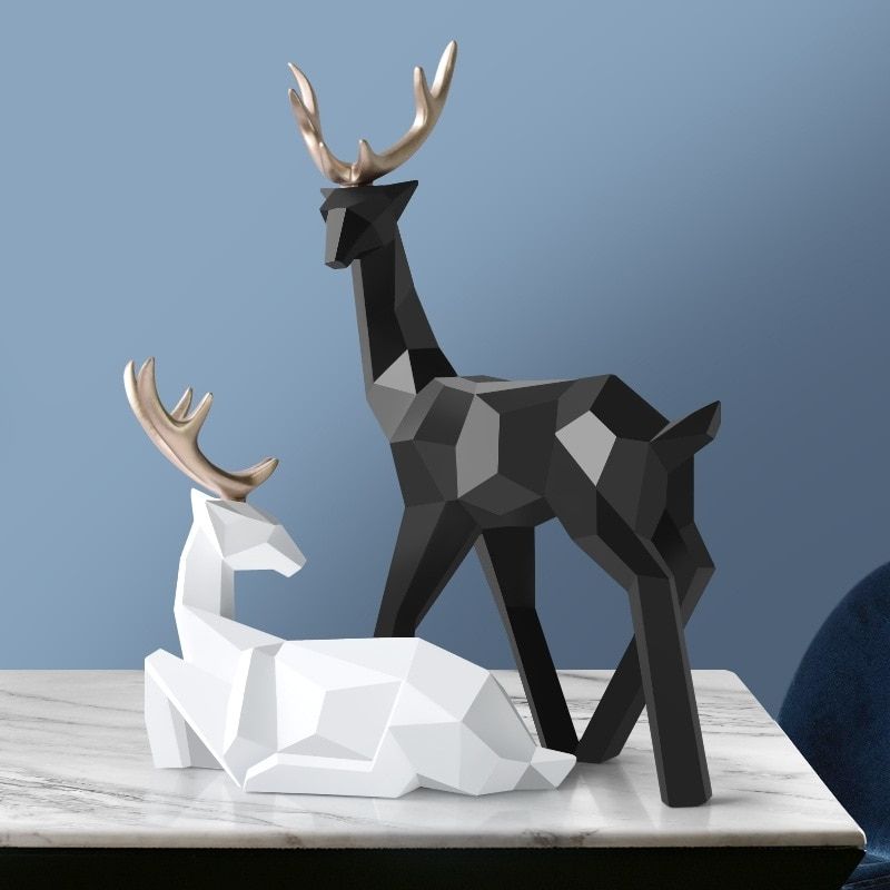 Estátua preta de origami cerf